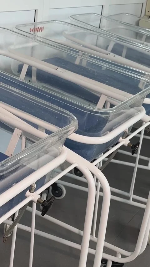 There are a lot of empty incubators for newborns in the hospital room. Stock Footage 312140877
