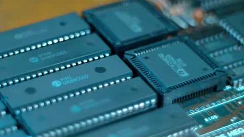 There are a lot of microchips on the board that are very close to each other Stock Footage 259860174