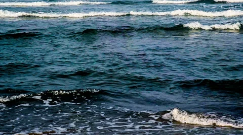 There are lots of waves wash up onto the beach-slow motion Stock-Footage 38818950