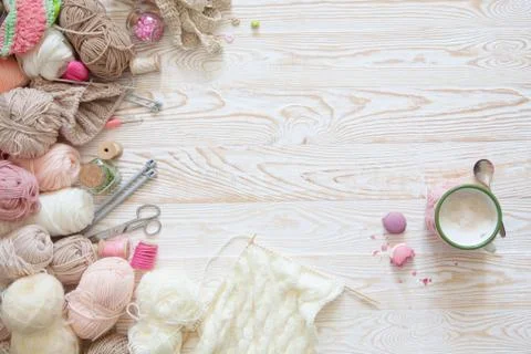 There are many different materials for needlework. Knitting and sewing. A girl Stock Photos