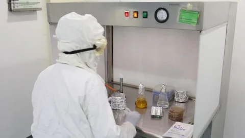 There are many different people doing tests inside the lab Stock Footage 277135705
