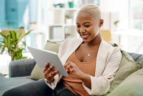 There are many efficient ways to handle business. a young businesswoman using a Photos