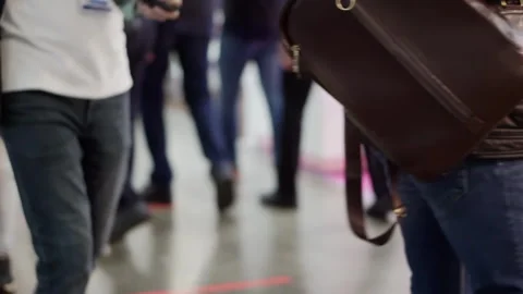 There are many people in the large, bright lobby of the business center. Stock Footage 164590662