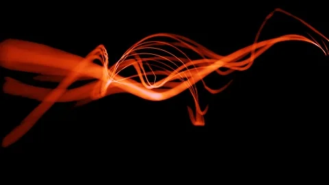 There are moving blurred light strips on the background. Multi-colored rays. LED Stock Footage 252268232