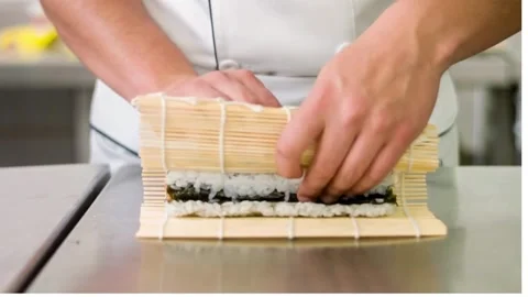There are other types of sushi as well. One of them is makizushi (rolled sushi). Stock Footage 276997846