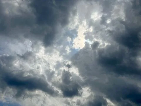 There are soft fluffy clouds in the sky Stock Photos
