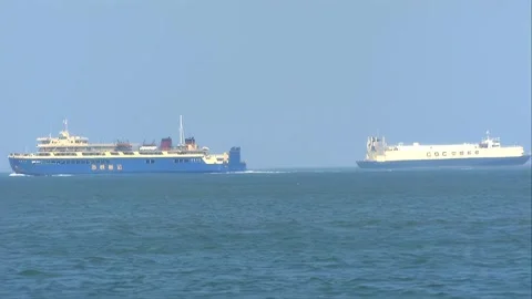 There are two cargo ships in the distance Stock Footage 253773189