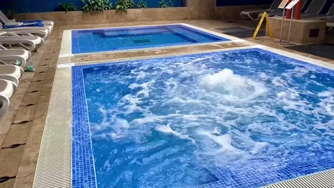 There are two swimming pools with thermal water in the hall. Stock Footage 252759479