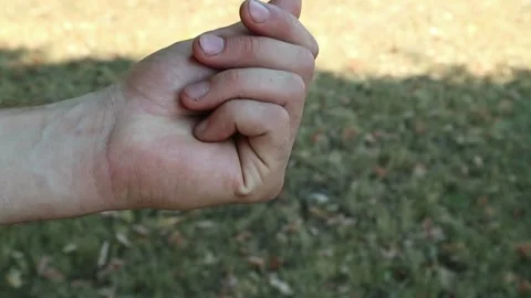 There are two wedding rings in a woman's hand Stock Footage 156981298