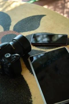There are various electronic devices on the table 스톡 사진