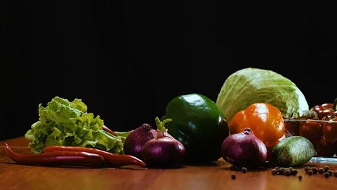 There are vegetables on the table. Stock Footage 75950750