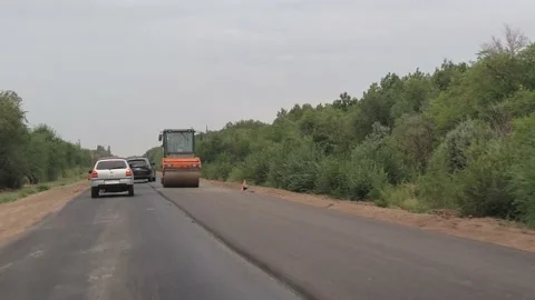 There is asphalt laid on one side of the traffic, due to repair Video stock 163654468