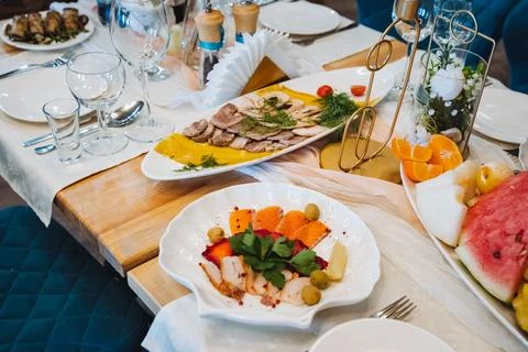 There is a beautifully arranged table that features an array of delicious p.. Stock Photos