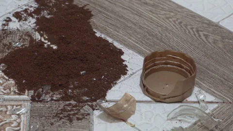 There is a broken can of coffee lying Stock-Footage 304032700