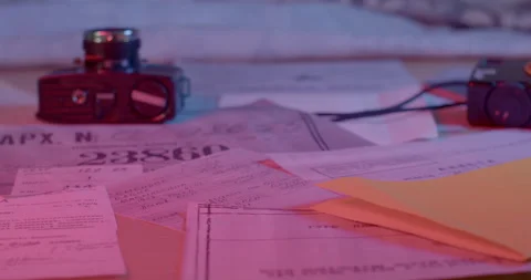 There camera with secret documents on the table. The inscription case number Видео 197327699