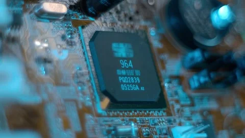 There is a chip on the circuit board of a computer motherboard Stock Footage 259791923