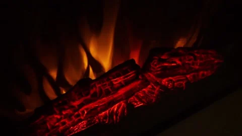 There is an electric fireplace Stock Footage 145426910