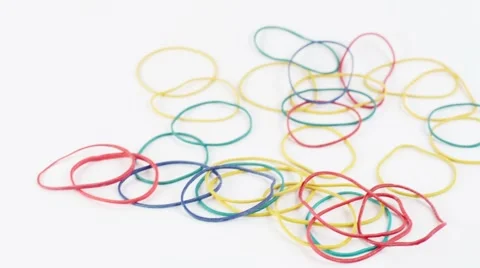 There is a heap of multi-colored rubber bands then disappears Stock Footage 42334307