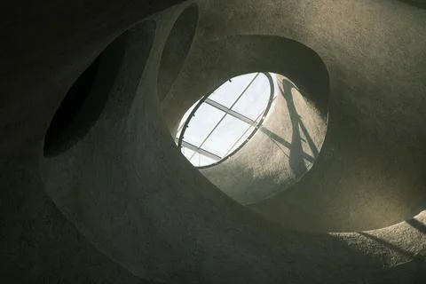 There is a large circular window inside the building to get in Fotos de archivo