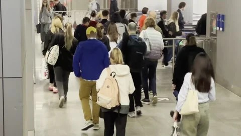 There is a large dense flow of passengers at the Pechatniki station crossin.. Stock Footage 311556448