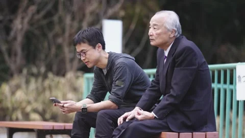 There is a lot of greenery in Japan's Spring Noon Park. A Japanese man from the Stock Footage 307594248
