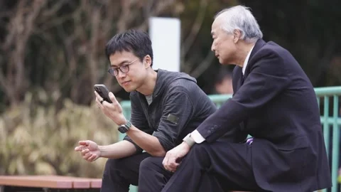 There is a lot of greenery in Japan's Spring Noon Park. A Japanese man from the Stock Footage 307594733