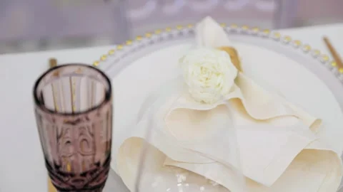 There is a napkin on the tray on the table and an empty glass. Close-up shooting Stock Footage 281016959