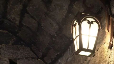 There is a night lamp on the ancient wall Stock Footage 253785494
