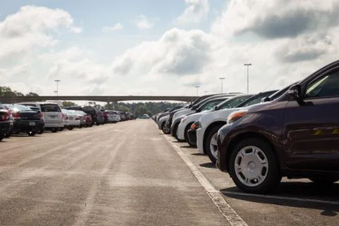 There is no free space on a large asphalt parking lot with a blue sky and clo Stock Photos