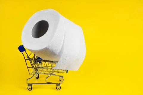 There is no toilet paper. Shopping cart for products with toilet paper on a y Stock Photos