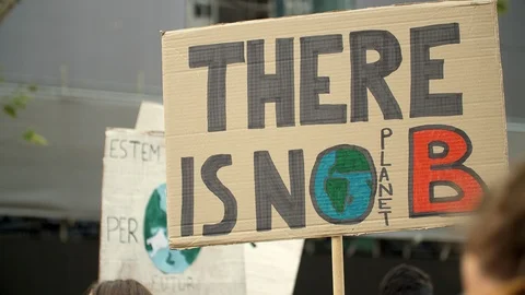 There is not Planet B. Poster and blurry old man close up. Global Climate Strike Video stock 116799207