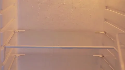 There is only water in the empty refrigerator Video stock 229184103