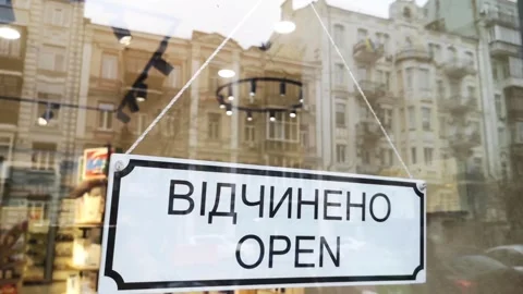 There is an Open sign on the store window. Ukraine Video stock 264036038