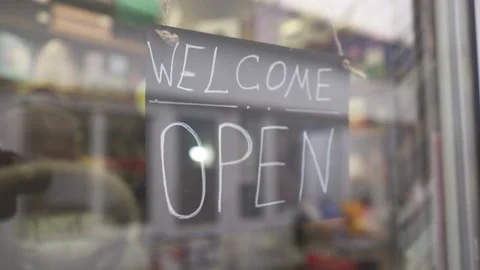 There is an Open sign on the store window 스톡 동영상 264095146