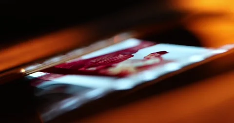 There is a phone on the table 2 Stock Footage 332172826