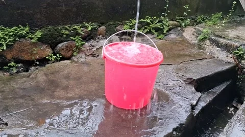 There is rainwater in the bucket (3) Stock Footage 308422139