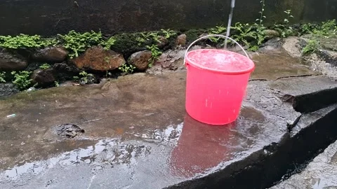 There is rainwater in the bucket (5) Stock Footage 308422149