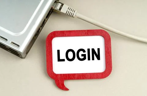 There is a router connected to the network on the table, next to a sign that  写真素材