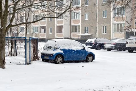 There is snow on the car. Stock Photos