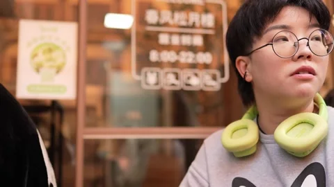There is a stall on public roads on weekends in Shanghai, China. Women in their 動画素材 300926640