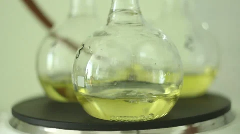 There is a test-tube with the boiling substance on the hot plate Stock Footage 36622351