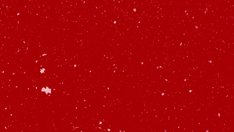 There is white snow falling on a red background. Stock Footage 310409203