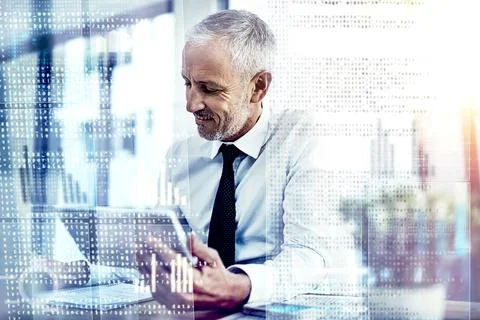 Theres no bugs in this code. a mature businessman working on programming code. Foto stock