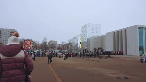 There's a queue outside, a big queue in the building Stock Footage 301460073