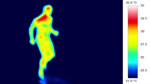 Thermal camera male body core IR infrared heat scan, exercising Stock Footage