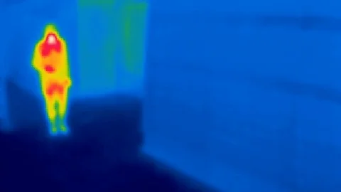 Thermal camera view,  Walking human in a street Stock Footage 98866222
