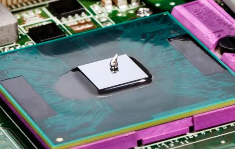 Thermal compaund on video chipset inside laptop Stock Photos