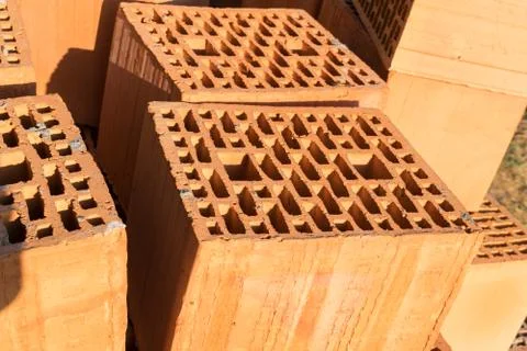 Thermal efficient clay bricks on a house construction site Stock Photos