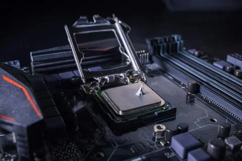 Thermal grease paste on computer processor chip. Thermal compound on on PC CPU Stock Photos