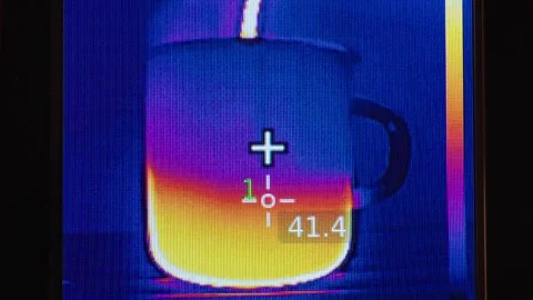 Thermal Imaging Of Metal Mug Heating From Hot Water Stock Footage 329277445